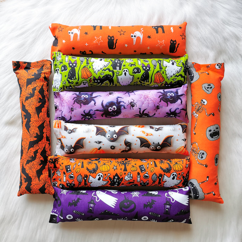 Halloween themed catnip cat toy kickers, 10 inches long in various Halloween fabrics, filled with strong smelling catnip