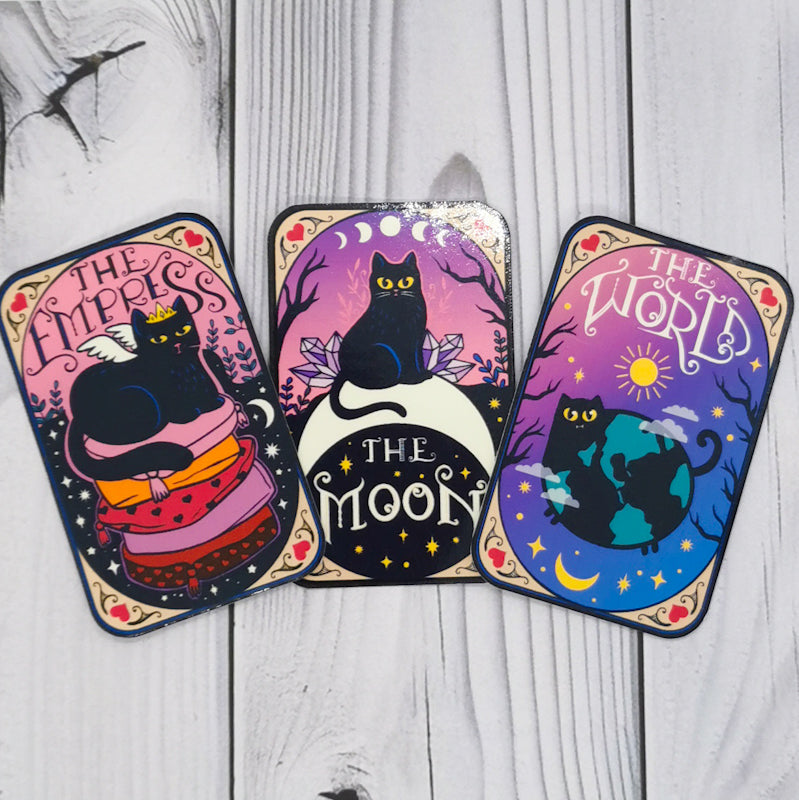 Three of the cat tarot stickers, the empress, the moon and the world