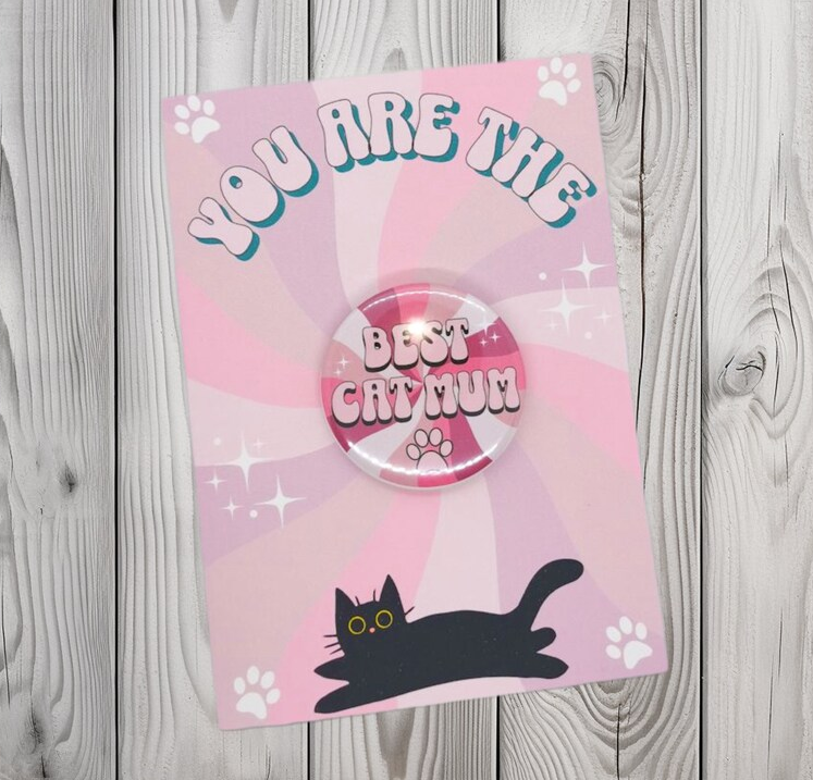 Picture shows a greeting card with a best cat mum badge attached, perfect for mother's day