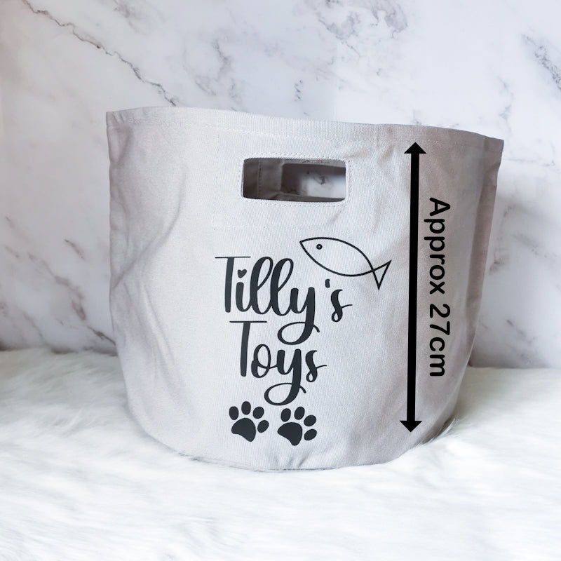 photo shows one pet storage tote which has the words tilly's toys on, the photo displays the height of the storage tote which is approximately 27cm