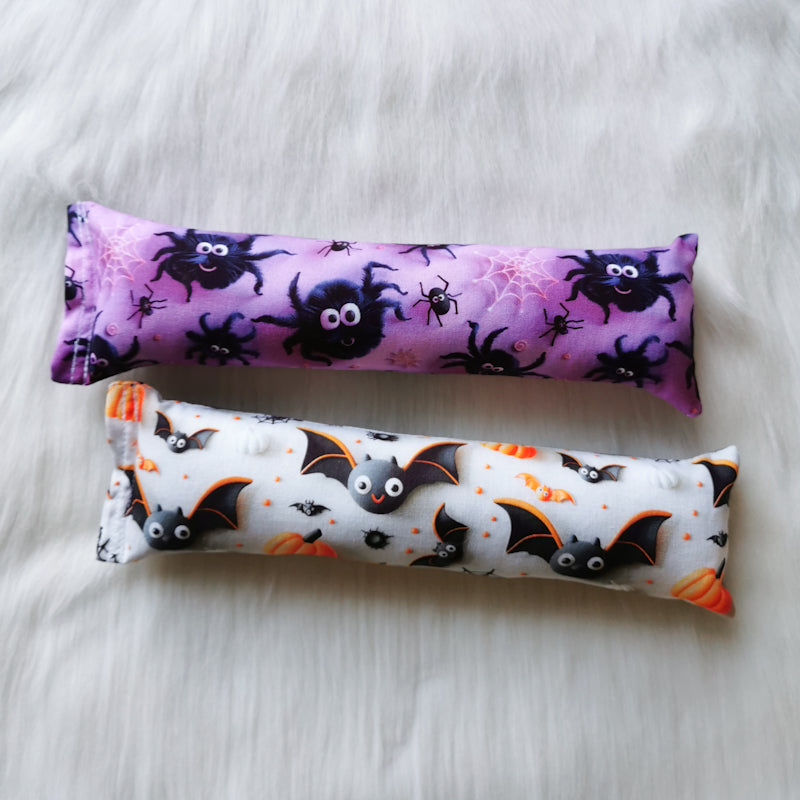 Halloween themed catnip cat toy kickers, 10 inches long in various Halloween fabrics, filled with strong smelling catnip