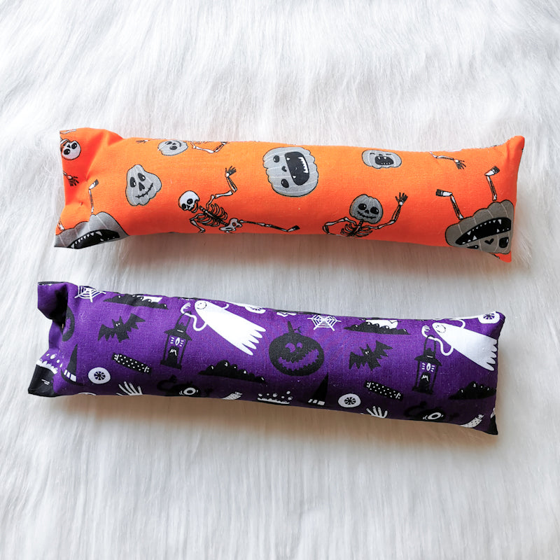 Halloween themed catnip cat toy kickers, 10 inches long in various Halloween fabrics, filled with strong smelling catnip