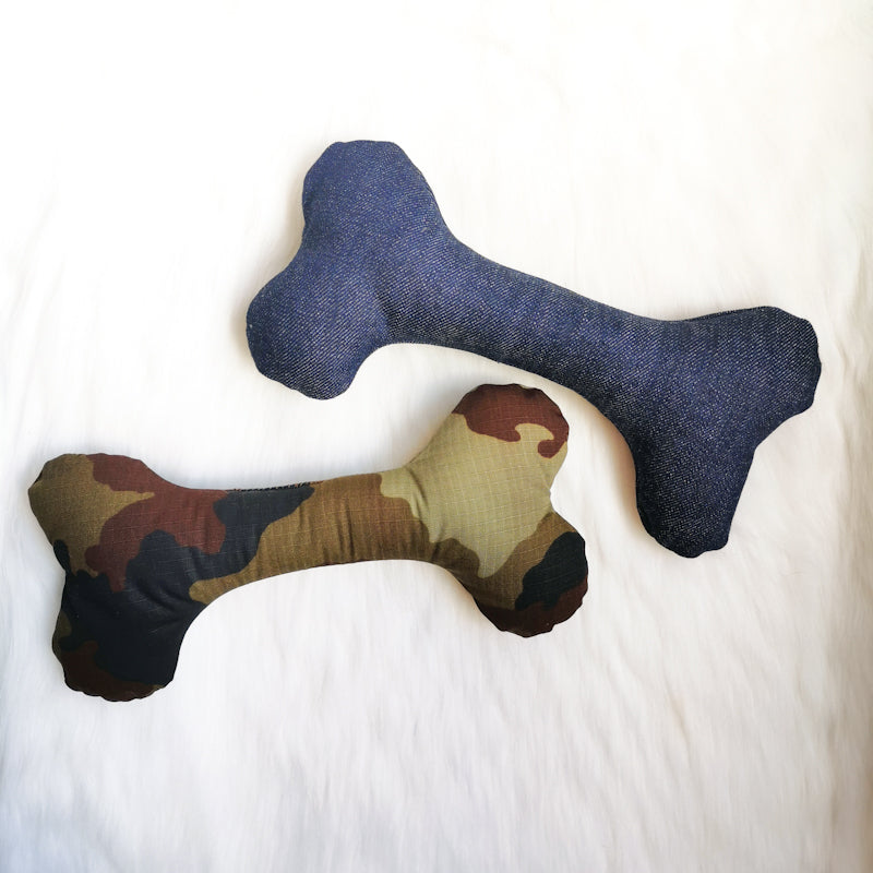 Picture shows two dog toys, one made from denim and the other made from a hardwearing camo fabric