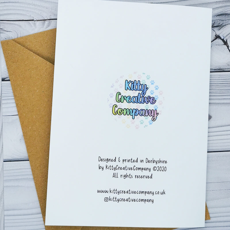 The back of the greeting card which shows the kitty Creative Company branding 