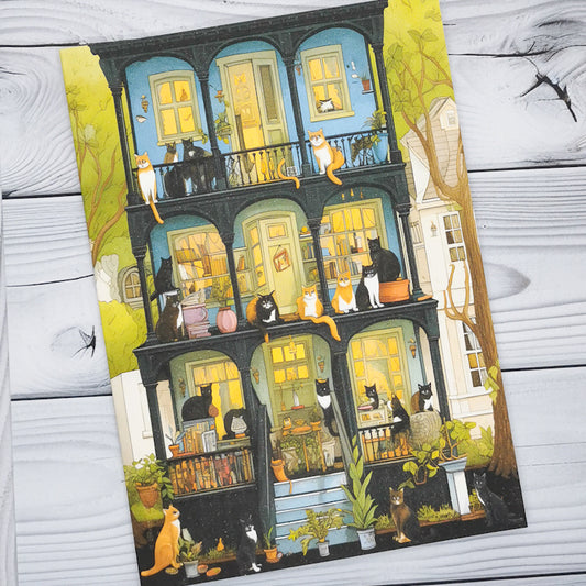 a funny cat greeting card depicting badly drawn cats occupying an apartment building, makes a great card for cat lovers