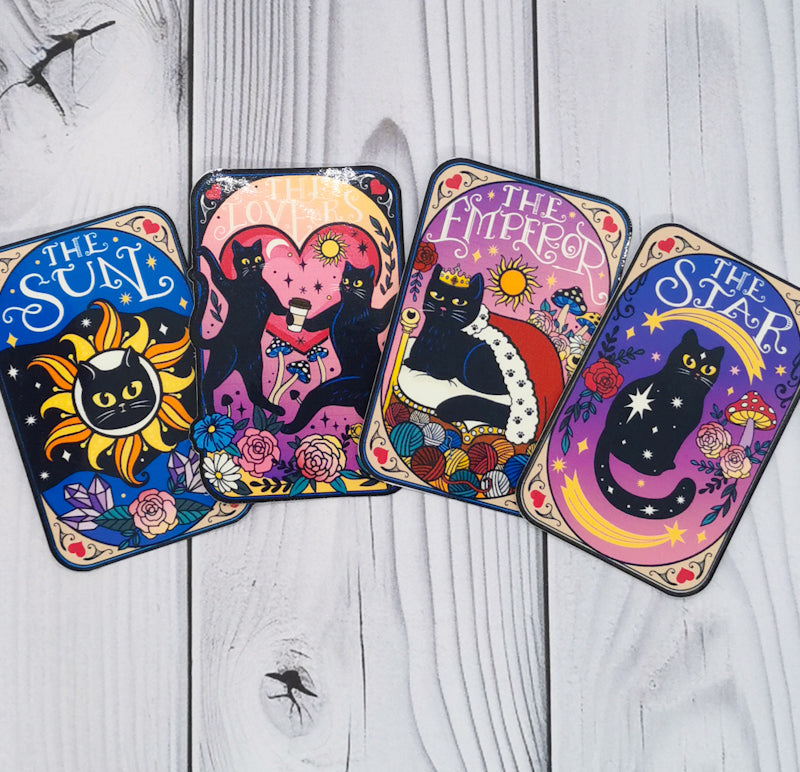 Four of the cat tarot stickers, the sun, the lovers, the emperor and the star