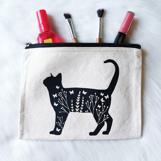 photo shows an accessory bag or make up pouch depicting a floral cat, the pouch is plenty spacious enough to fit make-up or accessories in and would make the perfect gift for any cat lover or crazy cat lady