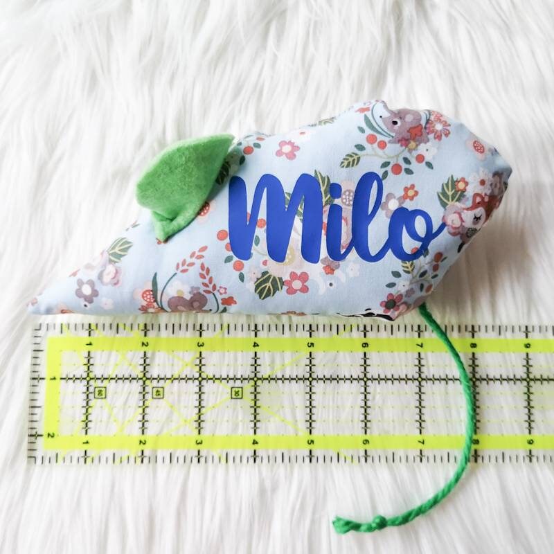 Catnip Cat Toy Mouse against a ruler to show the size